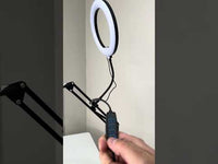 Lámpara LED con sujetador para celular